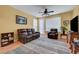 Inviting living room featuring a comfortable leather sofa and chair at 4802 Regalo Bello St, Las Vegas, NV 89135