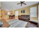 Open floor plan living area with a view into the kitchen area at 4802 Regalo Bello St, Las Vegas, NV 89135
