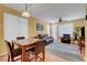 Cozy eat-in kitchen and Gathering room combo with doors leading to the backyard at 4802 Regalo Bello St, Las Vegas, NV 89135