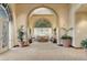 Inviting lounge area with large windows, comfortable seating, and elegant decor at 4802 Regalo Bello St, Las Vegas, NV 89135