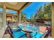 Covered outdoor patio featuring a table with seating at 4802 Regalo Bello St, Las Vegas, NV 89135