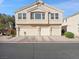 A charming two-story home with a three-car garage and beautiful desert landscaping at 4830 Double Down Dr # 102, Las Vegas, NV 89122