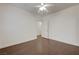 A bright bedroom with wood floors and a view to the hallway at 5250 S Rainbow Blvd # 2183, Las Vegas, NV 89118