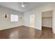 Spacious bedroom with hardwood floors, recessed lighting, and ensuite bathroom at 5250 S Rainbow Blvd # 2183, Las Vegas, NV 89118