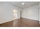 Bright bedroom with wood floors features ensuite bath and walk-in closet at 5250 S Rainbow Blvd # 2183, Las Vegas, NV 89118
