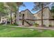 A beautiful condo building with well-maintained landscaping and a welcoming entrance at 5250 S Rainbow Blvd # 2183, Las Vegas, NV 89118