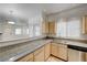Bright kitchen features granite countertops and stainless steel appliances at 5250 S Rainbow Blvd # 2183, Las Vegas, NV 89118