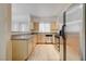 Updated kitchen includes stainless steel appliances and light wood cabinets at 5250 S Rainbow Blvd # 2183, Las Vegas, NV 89118