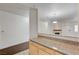 Spacious kitchen with granite counters and a view of the living area at 5250 S Rainbow Blvd # 2183, Las Vegas, NV 89118