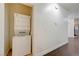 Hallway laundry area with stacked washer and dryer at 5250 S Rainbow Blvd # 2183, Las Vegas, NV 89118