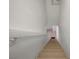 Stairwell with wood stairs and white walls at 5250 S Rainbow Blvd # 2183, Las Vegas, NV 89118