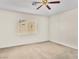Bedroom with neutral walls, carpet, and a window at 5373 Blue Oat Ave, Las Vegas, NV 89141