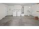 Garage with washer, dryer, and water heater at 5373 Blue Oat Ave, Las Vegas, NV 89141