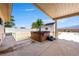 Enjoy outdoor living with a private hot tub and covered patio, perfect for relaxing and entertaining at 5450 Grain Mill Rd, Pahrump, NV 89061
