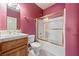 Cozy full bathroom with sliding glass door and single sink with storage at 5450 Grain Mill Rd, Pahrump, NV 89061