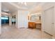 An open bathroom features tile flooring, a vanity, and a ceiling fan at 5450 Grain Mill Rd, Pahrump, NV 89061