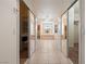 Primary bathroom with large closets, dual vanity sinks, garden tub, and walk-in shower at 5450 Grain Mill Rd, Pahrump, NV 89061