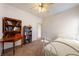 Cozy bedroom with carpet, small bookcases, and a twin bed at 5450 Grain Mill Rd, Pahrump, NV 89061