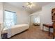 Bedroom with carpet, desk, and large closet with mirrored doors at 5450 Grain Mill Rd, Pahrump, NV 89061