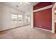 Comfortable bedroom featuring carpet flooring, a window, and closet at 5450 Grain Mill Rd, Pahrump, NV 89061