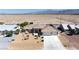 Beautiful home featuring desert landscaping and proximity to scenic mountain views at 5450 Grain Mill Rd, Pahrump, NV 89061