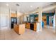 Gourmet kitchen features stainless steel appliances, granite countertops, and tile flooring at 5450 Grain Mill Rd, Pahrump, NV 89061