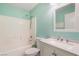 Bathroom with a shower-tub combo, toilet, and updated vanity with a new countertop at 5544 Cloudy Glen St, North Las Vegas, NV 89031