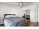 Bedroom with a ceiling fan, a sliding door closet, and a queen size bed at 5544 Cloudy Glen St, North Las Vegas, NV 89031