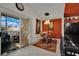 Dining area with a view to the balcony and a cozy atmosphere perfect for intimate meals at 605 Devonhall St # 202, Las Vegas, NV 89145