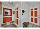 Entryway featuring stylish decor, including a built-in display niche, and an attractive set of doors at 605 Devonhall St # 202, Las Vegas, NV 89145