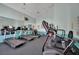 Well-equipped gym featuring treadmills, elliptical machines, and weight-lifting equipment for residents at 605 Devonhall St # 202, Las Vegas, NV 89145