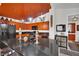 This stylish kitchen boasts black countertops, creative lighting fixtures and matching appliances at 605 Devonhall St # 202, Las Vegas, NV 89145