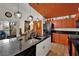 Modern kitchen with granite countertops, stainless steel appliances, and bright lighting fixtures at 605 Devonhall St # 202, Las Vegas, NV 89145