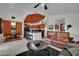 This open-concept living room features stylish decor and seamlessly connects to the dining area and kitchen at 605 Devonhall St # 202, Las Vegas, NV 89145