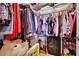 Spacious walk-in closet offering ample storage with clothes racks, shelves, and plenty of room for accessories at 605 Devonhall St # 202, Las Vegas, NV 89145