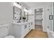 Bathroom featuring double sinks, a glass shower and a toilet at 6282 Dollar Bill Ct, Las Vegas, NV 89141
