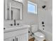 Clean and modern bathroom with a single sink, sleek fixtures, and a shower-tub combo at 6282 Dollar Bill Ct, Las Vegas, NV 89141