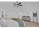 Bright bedroom, fan, and dresser add functional beauty at 6282 Dollar Bill Ct, Las Vegas, NV 89141