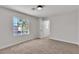 Inviting bedroom featuring a sunlit window view, offering a bright and airy ambiance at 6282 Dollar Bill Ct, Las Vegas, NV 89141