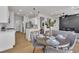 Open floorplan featuring a kitchen and dining area with view into the living room at 6282 Dollar Bill Ct, Las Vegas, NV 89141