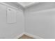 Spacious walk-in closet featuring neutral carpet and overhead shelving for ample storage at 6282 Dollar Bill Ct, Las Vegas, NV 89141
