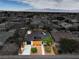 Overhead shot of a single-story home highlighting roof, front yard, and mature trees in a suburban area at 6320 Dayton Ave, Las Vegas, NV 89107