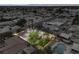A captivating aerial shot of the property with a lush backyard and mature trees at 6320 Dayton Ave, Las Vegas, NV 89107