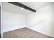 Bedroom with carpeted floor, beam accent, offering a serene and comfortable living space at 6320 Dayton Ave, Las Vegas, NV 89107
