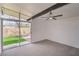 Cozy bedroom with sliding door and carpet at 6320 Dayton Ave, Las Vegas, NV 89107