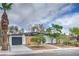 View of a single-story home showcasing xeriscaping, modern fence details, and well-kept landscaping at 6320 Dayton Ave, Las Vegas, NV 89107