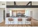Well-designed kitchen with modern stools and sleek countertops at 6320 Dayton Ave, Las Vegas, NV 89107