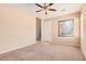 Neutral room with carpet, front door, and window providing natural light at 6620 Tulip Falls Dr, Henderson, NV 89011