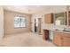 Bright sunroom area with tile floors and a sliding glass door at 6620 Tulip Falls Dr, Henderson, NV 89011