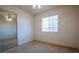 Cozy bedroom with carpet, a ceiling fan, and mirrored closet doors at 708 Canyon Country Cir, Henderson, NV 89002